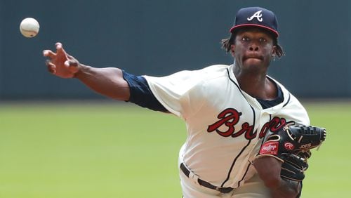 Atlanta Braves’ Touki Toussaint, making his MLB Debut, delivers a pitch against the Miami Marlins during the first inning in a MLB baseball game on Monday, August 13, 2018, in Atlanta. Toussaint went six innings while giving up 1 run on two hits with four strike outs.   Curtis Compton/ccompton@ajc.com