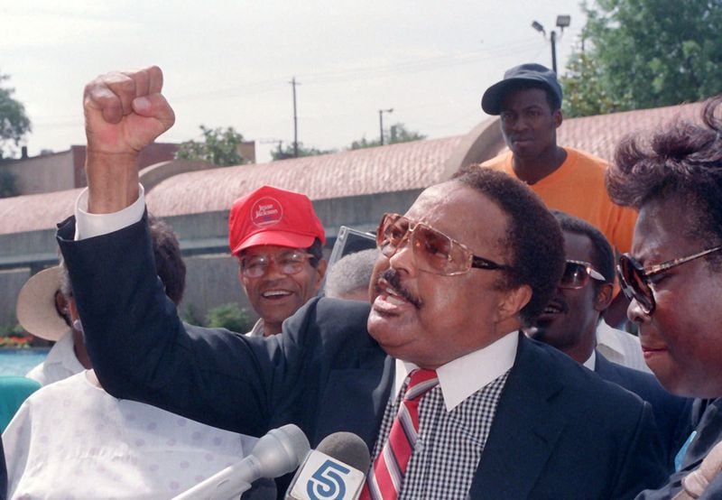 Civil rights activist Hosea Williams gestures during a news conference in Atlanta, Ga., in this July 13, 1988, photo.