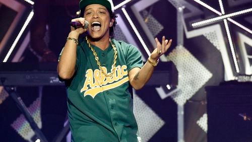Expert showman Bruno Mars will tear up the Music Midtown stage this fall. (Photo by Chris Pizzello/Invision/AP, File)