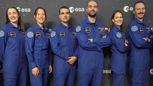 From left, Rosemary Cooga of Britain, Sophie Adenot of France, Raphael Liegeois of Belgium, Pablo Alvarez Fernandez of Spain, Katherine Bennell-Pegg of Australia and Marco Sieber of Switzerland, pose for a family photo at the graduation ceremony of astronaut candidates of the Class of 2022 at the European Astronaut Centre in Cologne, Germany, Monday, April 22, 2024. The new ESA astronauts took up duty at the European Astronaut Centre one year ago to be trained to the highest level of standards as specified by the International Space Station partners. Also concluding a year of astronaut basic training is Australian astronaut candidate Katherine Bennell-Pegg, who has trained alongside ESA's candidates. (AP Photo/Martin Meissner)
