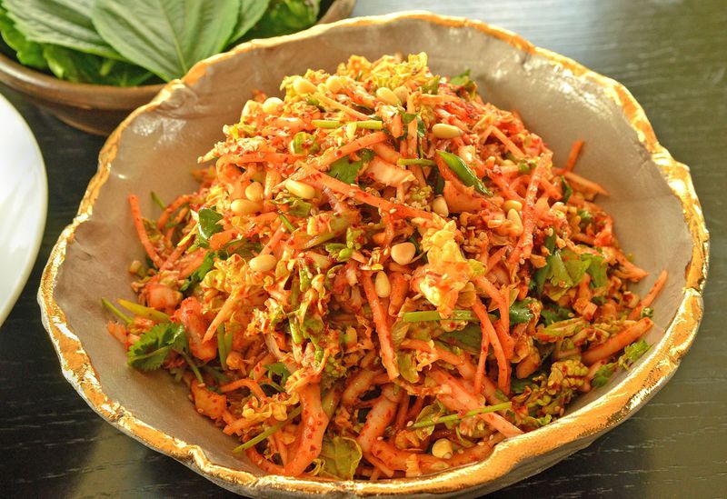 Whether in South Korean or the American South, you can’t have barbecue without slaw. This Kimchi Slaw is made with napa cabbage and doesn’t actually include kimchi, but the touch of vinegar mimics the nature of fermentation. The slaw is spicy, tart, crunchy and the perfect sidekick for grilled meats. (Photo by Chris Hunt/Special; styling by Seung Hee Lee)