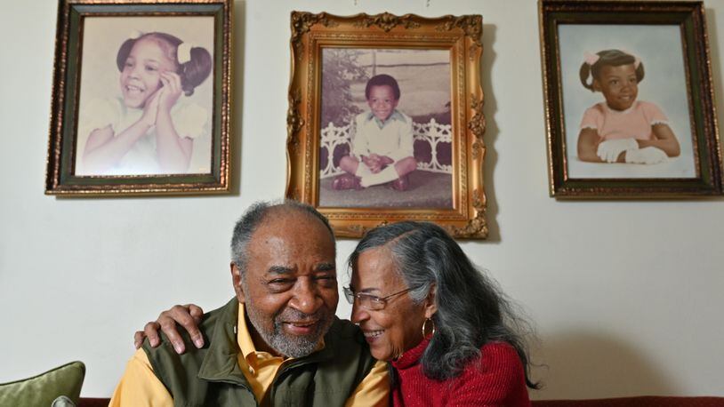 Gwen and James Middlebrooks were married 61 years ago by Dr. Martin Luther King Jr. Portraits of their three children aredisplayed on the wall at their home behind them. Hyosub Shin / Hyosub.Shin@ajc.com