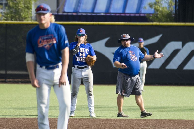 “To me, the part that she is a woman was not part of the equation. I saw a baseball player who wanted to play,” Georgia Highlands College baseball coach Dash O’Neill says of redshirt freshman Ashton Lansdell. Here, he’s speaking to Ashton during a baseball intrasquad scrimmage on Sept. 26, 2019. ALYSSA POINTER / ALYSSA.POINTER@AJC.COM