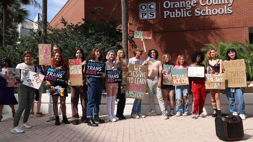 Students held a rally outside an Orange County School Board meeting on May 24, 2022, as a student group based at Winter Park High and a local group opposed to book bans gathered to rally against Florida laws, including the so-called "Don't Say Gay" law. (Ricardo Ramirez Buxeda/Orlando Sentinel/TNS)
