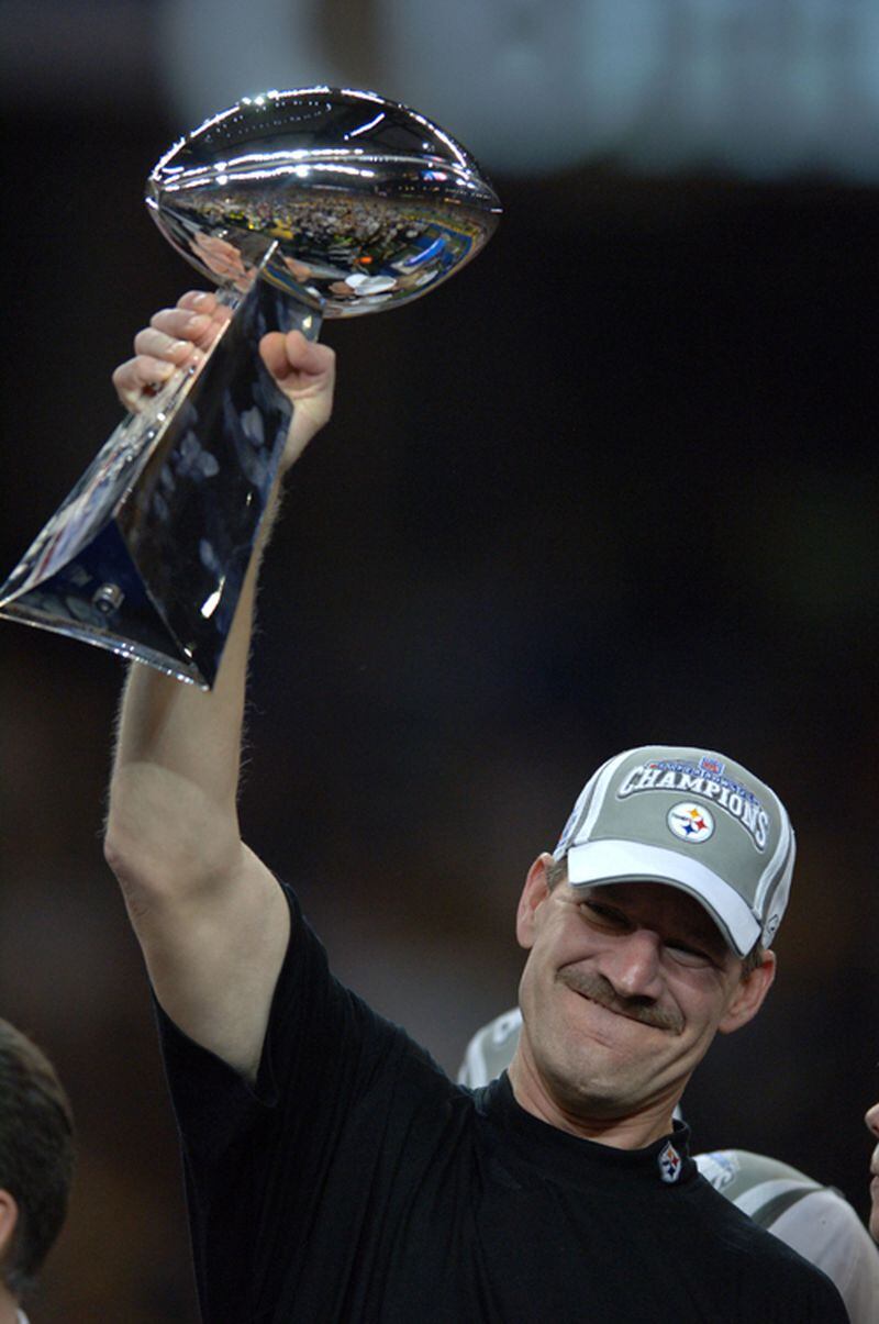 Pittsburgh Steelers head coach Bill Cowher holds the Lombardi Trophy after a 21-10 victory over the Seattle Seahawks in Super Bowl XL on Sunday, Feb. 5, 2006, in Detroit.