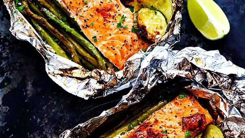 Grilled Lime Butter Salmon cooks in a foil packet on the grill. Contributed by The National Salmon Council and The Recipe Critic
