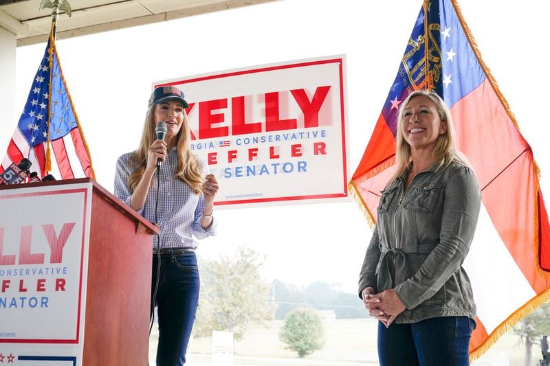 U.S. Sen. Kelly Loeffler and Marjorie Taylor Greene, then a Republican congressional candidate, campaign together in October 2020. Greene asked Loeffler in a text to talk “about a plan we are developing on how to vote on the electoral college votes on Jan 6th” with a goal of overturning Democrat Joe Biden's presidential victory. “I need a Senator!” Greene, then a congresswoman-elect, wrote to Loeffler on Dec. 2, 2020, “And I think this is a major help for you to win on the 5th!!”(AP Photo/Brynn Anderson)