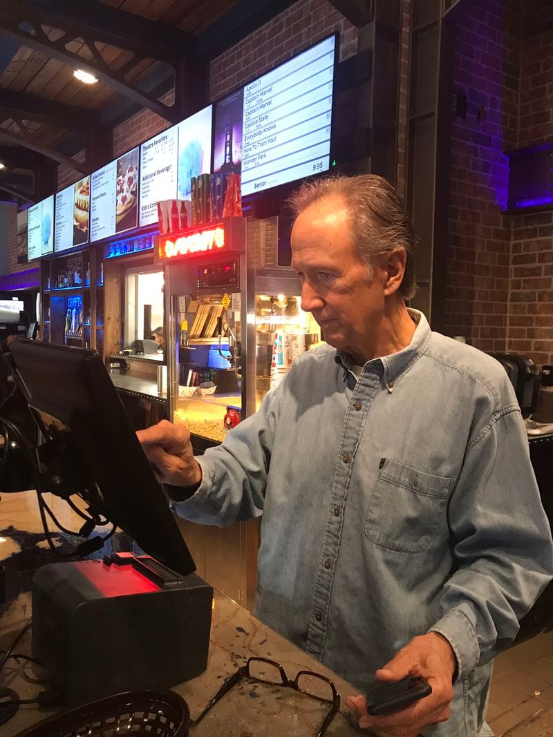 Bill Tush at work at The Springs Cinema and Taphouse in Sandy Springs March 21, 2019.