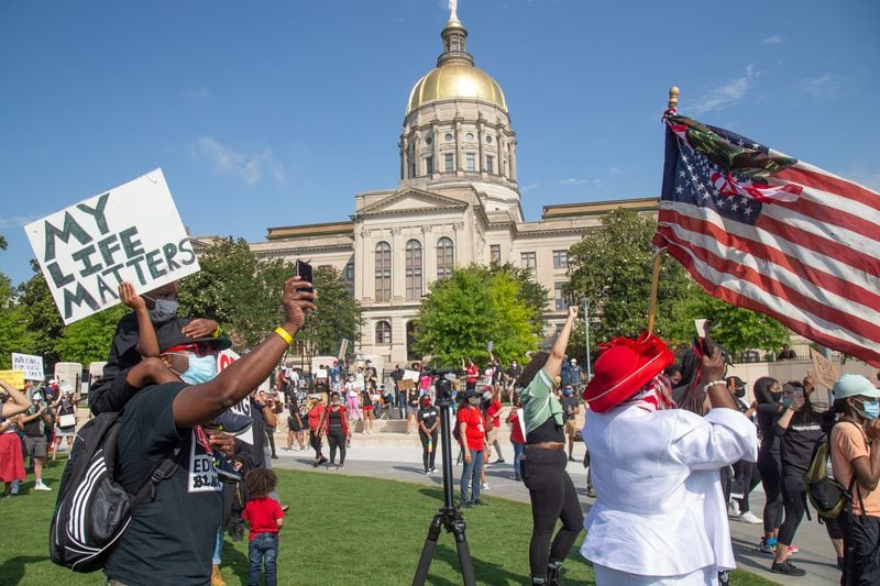 Protesters gathered at the Capitol in Atlanta on Friday morning.