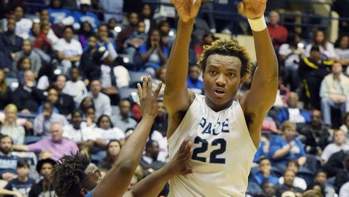 Pace Academy Knights Wendell Carter Jr (22) passes the ball during action as the Pace Academy Knights play the Manchester Blue Devils during the Class AA boys championship at the Macon Coliseum Friday, March 4, 2016. The Knights defeated the Blue Devils, 65-43. KENT D. JOHNSON/ kdjohnson@ajc.com