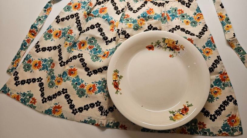 Sally Whaley Durrance sewed kitchen curtains, napkins, quilts and aprons for her granddaughters, using a fabric print that matched her everyday dishes. Courtesy of Julia Distelhurst