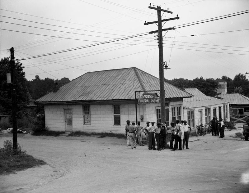 The burials of all four victims of the Moore’s Ford Bridge mass lynching were handled by black-owned Young Funeral Home in Monroe, Ga., shown here in July 1946. The case was never solved. (AJC Photo)