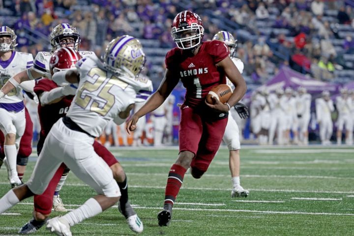 Warner Robins quarterback Jalen Addie (1) scores a rushing touchdown in the second half against Cartersville of the Class 5A state high school football final at Center Parc Stadium Wednesday, December 30, 2020 in Atlanta. Warner Robins won 62-28. JASON GETZ FOR THE ATLANTA JOURNAL-CONSTITUTION
