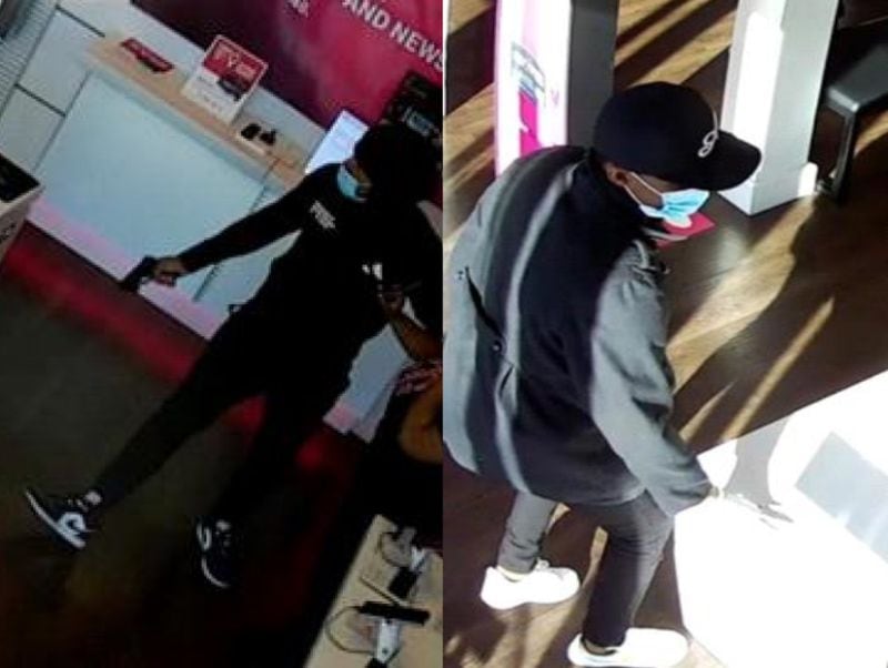 The two suspects are shown in surveillance photos from a Dec. 14 armed robbery at a T-Mobile store on Memorial Drive.
