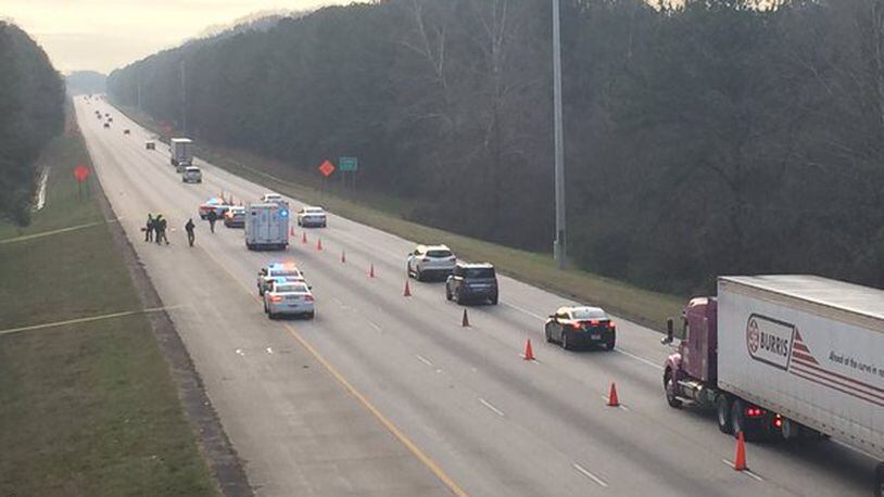 A man with a gunshot wound was found early Sunday morning on I-75 at the Cobb-Cherokee county line. (Credit: Channel 2 Action News)