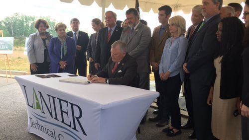Gov. Nathan Deal signed a record $23.7 billion state budget into law. JAMES SALZER / jsalzer@AJC.COM
