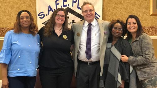Among those attending the recent “Where Do We Go From Here” Teen Summit in Powder Springs were (L-R) Helen Riley, CEO/Founder of Safe Place Atlanta; Cobb Juvenile Probation Supervisor Sharon Mashburn; Cobb Juvenile Judge Wayne Grannis; Rose Diggs, CEO of Down7 Up8 Inc. and Cobb Juvenile Probation Officer Ana Pinto. Courtesy of Cobb County