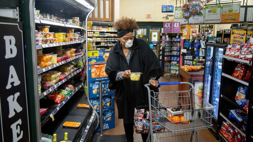 Martha Allen takes advantage of Kroger's new shopping hours for seniors over 60  Monday in Decatur, March 23 2020.    STEVE SCHAEFER / SPECIAL TO THE AJC