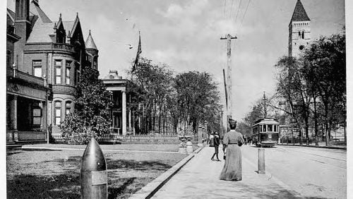 1890s -- Atlanta's Peachtree Street was once populated with a variety of mansions, including the Randolph-Lucas house, which has been moved to Ansley Park. LANE BROS. PHOTOGRAPHIC COLLECTION / GSU
