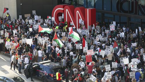 Several hundred protestors hold a pro Palestinian rally in front of the CNN Center, Friday, October 20, 2023, in Atlanta. (Jason Getz / Jason.Getz@ajc.com)