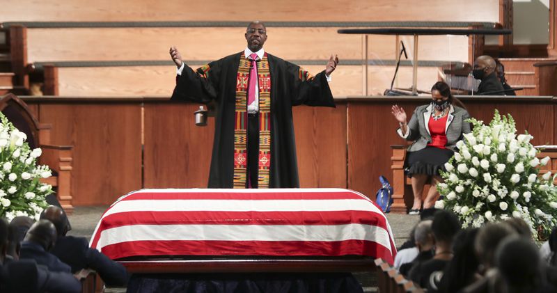 7/30/20 - Atlanta, GA -  Rev. Dr. Raphael Warnock offers a benediction to close the service.   On the sixth day of the “Celebration of Life” for Rep. John Lewis, his funeral is  held at Ebenezer Baptist Church in Atlanta, with burial to follow.   Alyssa Pointer / alyssa.pointer@ajc.com