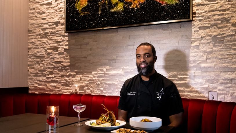 The Continent Atlanta Chef and Owner Scotley Innis. (Mia Yakel for The Atlanta Journal-Constitution)
