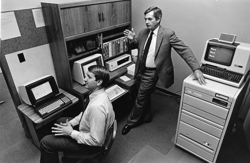 Georgia State University's Assistant Director of Student Information Systems, Mark Elliott, and Registrar Jim Greene, on April 2, 1985. Photo: Nick Arroyo