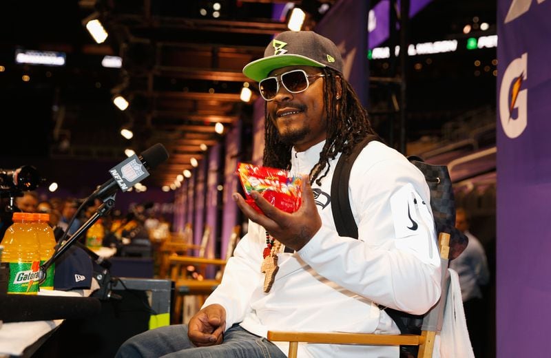 Eating Skittles isn't entirely detrimental to performance, as Seahawks running back Marshawn Lynch has demonstrated. (Photo by Christian Petersen/Getty Images)