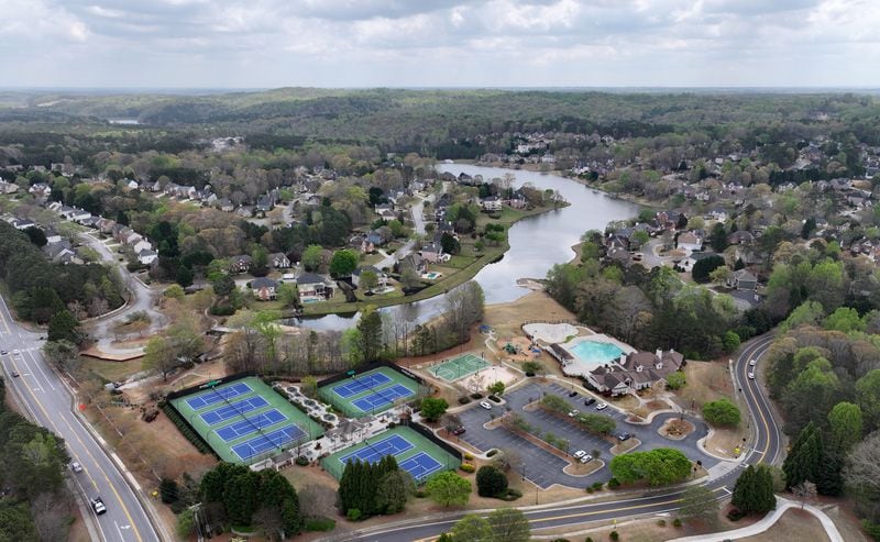 Aerial photograph shows the Hamilton Mill subdivision, a 2,200 home community nestled in the hills of Northeast Gwinnett County, Tuesday, April 2, 2024, in Dacula.  (Hyosub Shin / Hyosub.Shin@ajc.com)