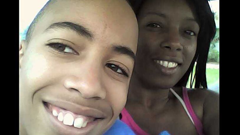 A family photo of Tomari Jackson and his mother Adell Forbes.