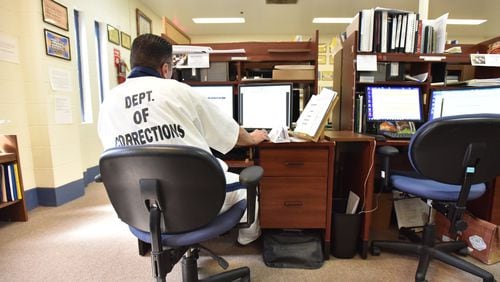 October 26, 2017 — Elmer Hamilton, an inmate at Central State Prison in Macon, is a certified braille transcriber, thanks to a prison program that teaches felons the daunting skills of braille transcription. It takes at least a year to become certified in braille and a few years more to become proficient in the language. Interested inmates must have above-average reading and math scores, a high school education, and no disciplinary history. HYOSUB SHIN / HSHIN@AJC.COM