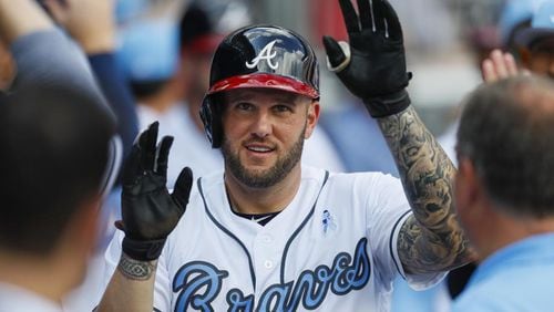 Matt Adams had three extra-base hits including a home run and four RBIs in Saturday’s 10-inning win against the Marlins, giving him nine homers and 25 RBIs in his first 26 games with the Braves. (AP photo)