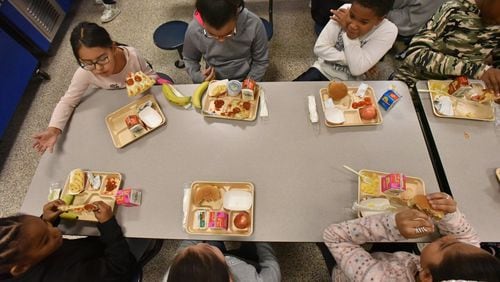 Students eat their lunches during a lunch break at Corley Elementary School on Wednesday, Dec. 12, 2018. Several Gwinnett County Schools are participating in a food audit this year to identify food waste and find a way to reduce it. HYOSUB SHIN / HSHIN@AJC.COM