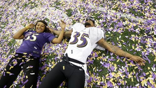 Baltimore Ravens running back Anthony Allen and his sister Alexis celebrate the Ravens' 34-31 win in the NFL Super Bowl XLVII football game against the San Francisco 49ers Sunday, Feb. 3, 2013, in New Orleans. (AP Photo/Marcio Sanchez)