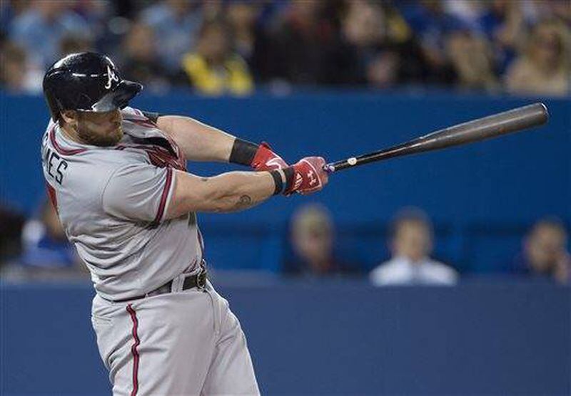 Jonny Gomes had four RBIs Sunday at Toronto including this bases-clearing double. He's had success against Tuesday Mets starter Jonathon Niese. (Canadian Press via AP)