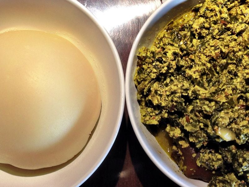 Pounded yam and egusi soup are a traditional West African pair served at Cafe Songhai. CONTRIBUTED BY WYATT WILLIAMS