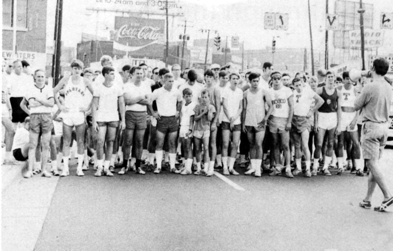 The starting line of the first Peachtree Road Race. Geoff Collins said he thinks his father is the young man in the middle of the photo, in the second row behind the two boys, in the white shirt with his head down. (Courtesy Atlanta Track Club)