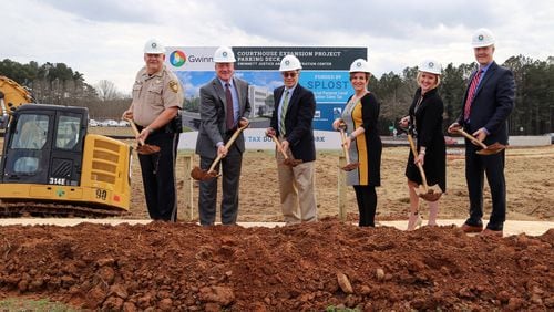 Gwinnett officials and judges recently broke ground for the first phase of construction on a $75-million parking deck and courthouse addition behind the Gwinnett Justice and Administration Center in Lawrenceville. Courtesy Gwinnett County
