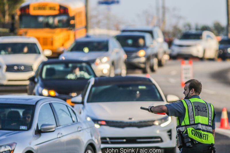 Delays lasted for hours at the  intersection of Jimmy Carter and Peachtree Industrial boulevards. JOHN SPINK / JSPINK@AJC.COM