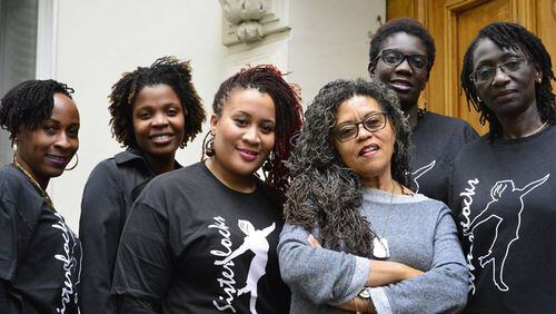 Sisterlocks founder JoAnne Cornwell (center), and other women rocking natural hairstyles. Cornwell will be in Atlanta this weekend for a natural hair conference
