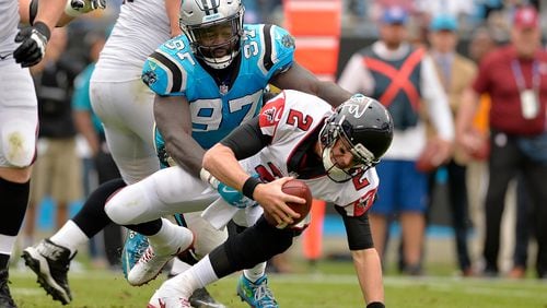 CHARLOTTE, NC - NOVEMBER 05:  Mario Addison #97 of the Carolina Panthers sacks Matt Ryan #2 of the Atlanta Falcons in the fourth quarter during their game at Bank of America Stadium on November 5, 2017 in Charlotte, North Carolina.  (Photo by Grant Halverson/Getty Images)