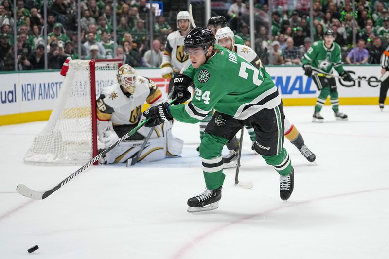 Dallas Stars center Roope Hintz (24) chases the puck against the Vegas Golden Knights during the first period in Game 2 of an NHL hockey Stanley Cup first-round playoff series in Dallas, Wednesday, April 24, 2024. (AP Photo/Tony Gutierrez)