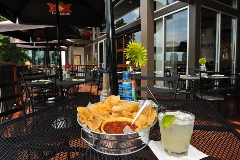 Tin Lizzys patio with chips and house margarita. (BECKY STEIN)