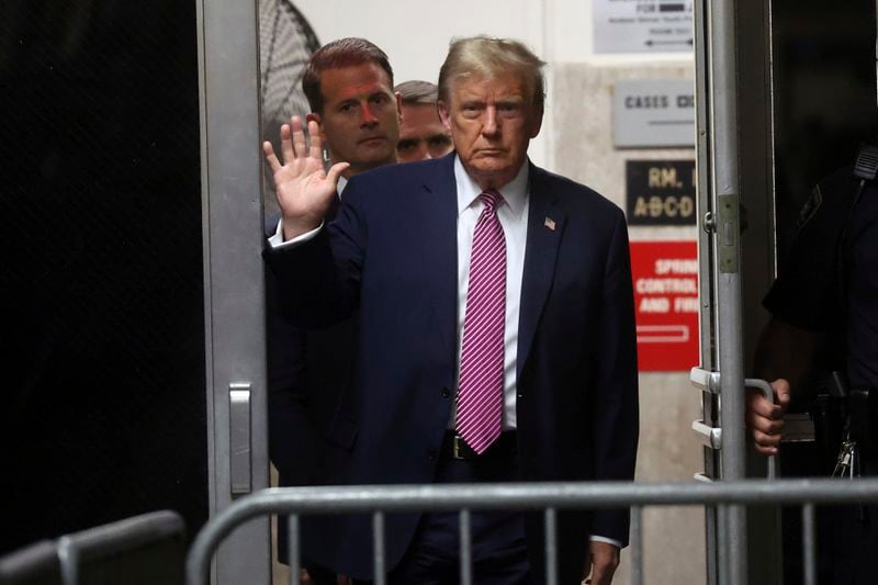 Former President Donald Trump gestures as he returns to the courtroom following a lunch break in his trial, Friday, April 19, 2024, at Manhattan Criminal Court in New York. (Spencer Platt/Pool Photo via AP)