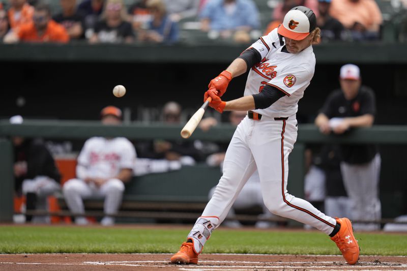 Baltimore Orioles' Gunnar Henderson hits a home run during the first inning of a baseball game against the Minnesota Twins, Wednesday, April 17, 2024, in Baltimore. (AP Photo/Jess Rapfogel)