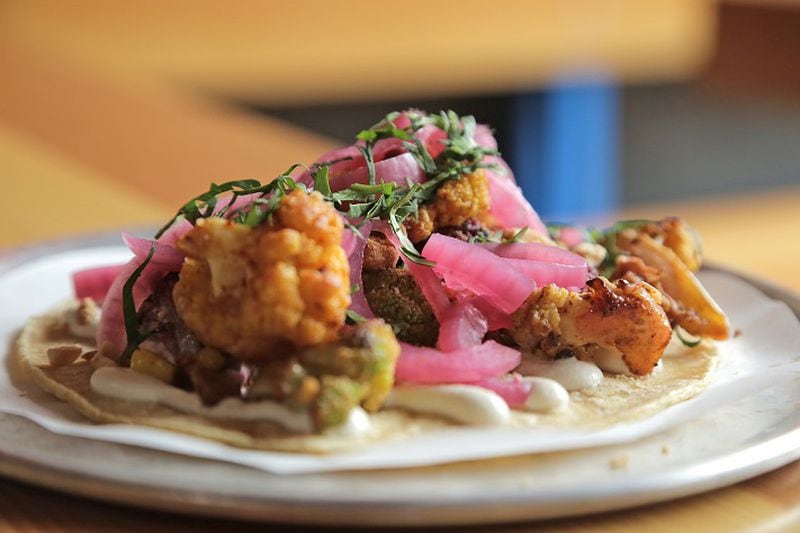 The rainbow cauliflower taco with grilled corn and cashew puree is a vegan-friendly menu item at Trejo's Cantina in Hollywood, Calif. (Myung J. Chun/Los Angeles Times/TNS)
