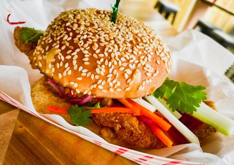 The Velvet Hippo's Vietnamese-style fish sandwich is served on a soft, round bun but has the classic flavors of a banh mi. Courtesy of the Velvet Hippo