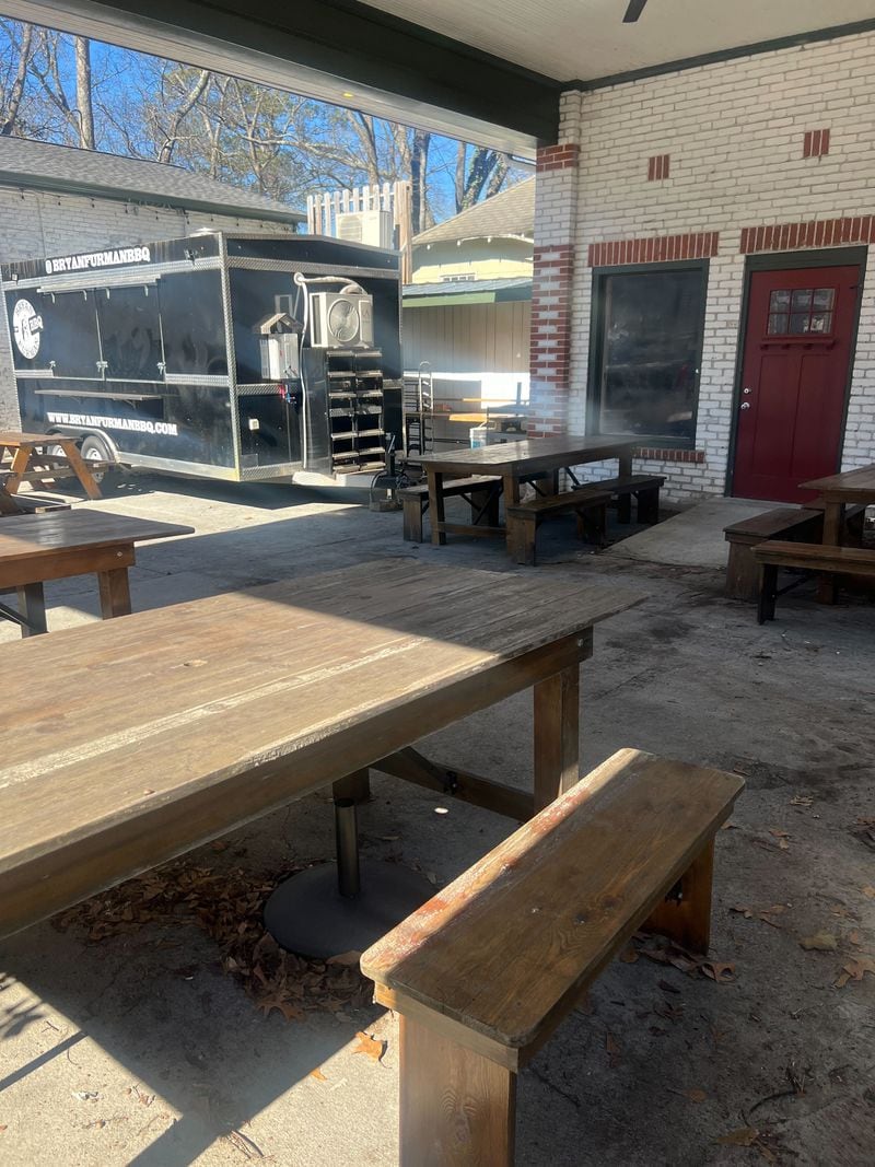 The patio at Pure Quill Superette is currently home to a pop-up featuring barbecue from Bryan Furman. / Courtesy of Pure Quill Superette