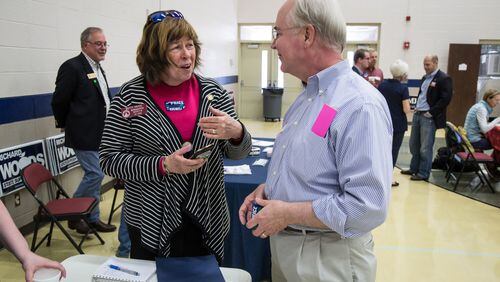 State Rep. Betty Price talks with her husband, former U.S. Rep. Tom Price, during the 6th Congressional District BBQ Roundup in Roswell, GA Saturday, April 21, 2018. STEVE SCHAEFER / SPECIAL TO THE AJC