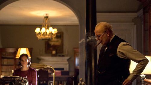 Lily James, left, plays a secretary to Winston Churchill (Gary Oldman). Contributed by Jack English, Focus Features